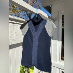 Women’s cashmere short sleeved sweater.